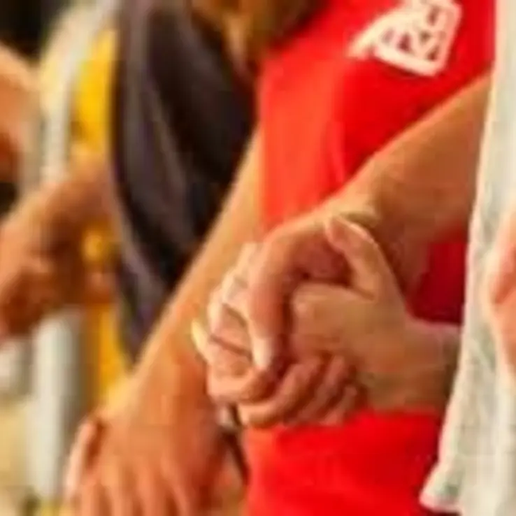 Holding Hands In Prayer